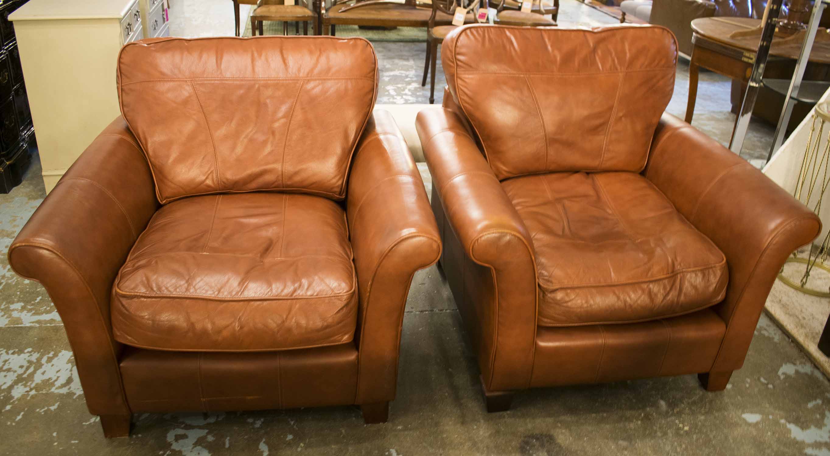 ARMCHAIRS, a pair, brown leather, 97cm W.