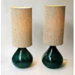 LAMPS, a pair, green glass, vase shaped with tall grey linen shades, 94cm H.