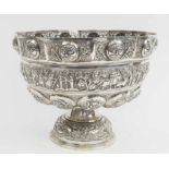 INDIAN STANDING BOWL, white coloured metal, repousse decoration of figures, elephants,