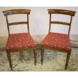 DINING CHAIRS, a set of six, William IV rosewood with red patterned upholstery and caned seats.