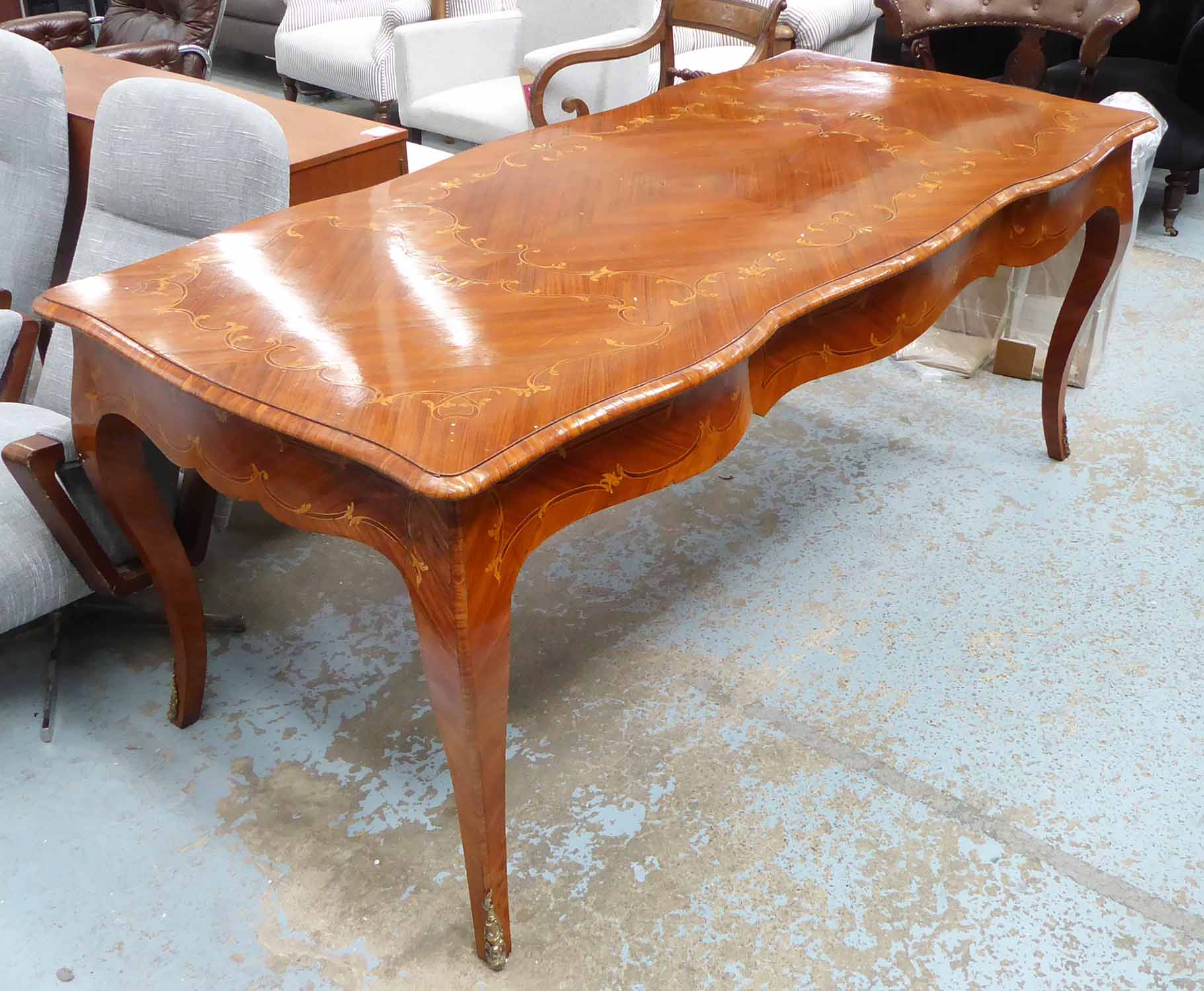 LIBRARY TABLE, Louis XV style, marquetry top, with brass mounts.