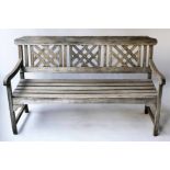 GARDEN BENCH, weathered teak, with trellis back, 150cm W (matching previous lot).