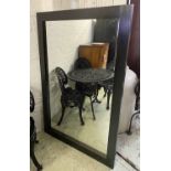 WALL MIRROR, contemporary style with a dark wooden frame, 106cm x 156cm H.