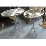 SIDE TABLES, a pair, Hollywood Regency style design, oval mirrored tops, 71cm H.