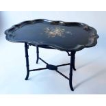 TRAY TABLE, Victorian, black lacquered and hand painted floral decoration papier-mâché,