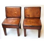 COCKTAIL CHAIRS, a pair, low Art Deco style, tan leather upholstered, 47cm W x 72cm H.