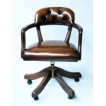 REVOLVING DESK CHAIR, 1970s Norwegian, studded mid brown leather upholstered and buttoned back,