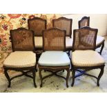 DINING CHAIRS, a set of six, Continental style with carved oak frames, caned seats and backs,