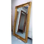 MIRROR, of large proportions, Continental style, gilt frame with bevelled glass, 208cm x 115cm.