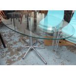ATTRIBUTED TO DWELL DINING TABLE, tempered oval glass top on chromed base,