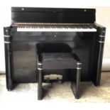 EAVESTAFF MINI PIANO, Art Deco, in an ebonised and chrome mounted case,