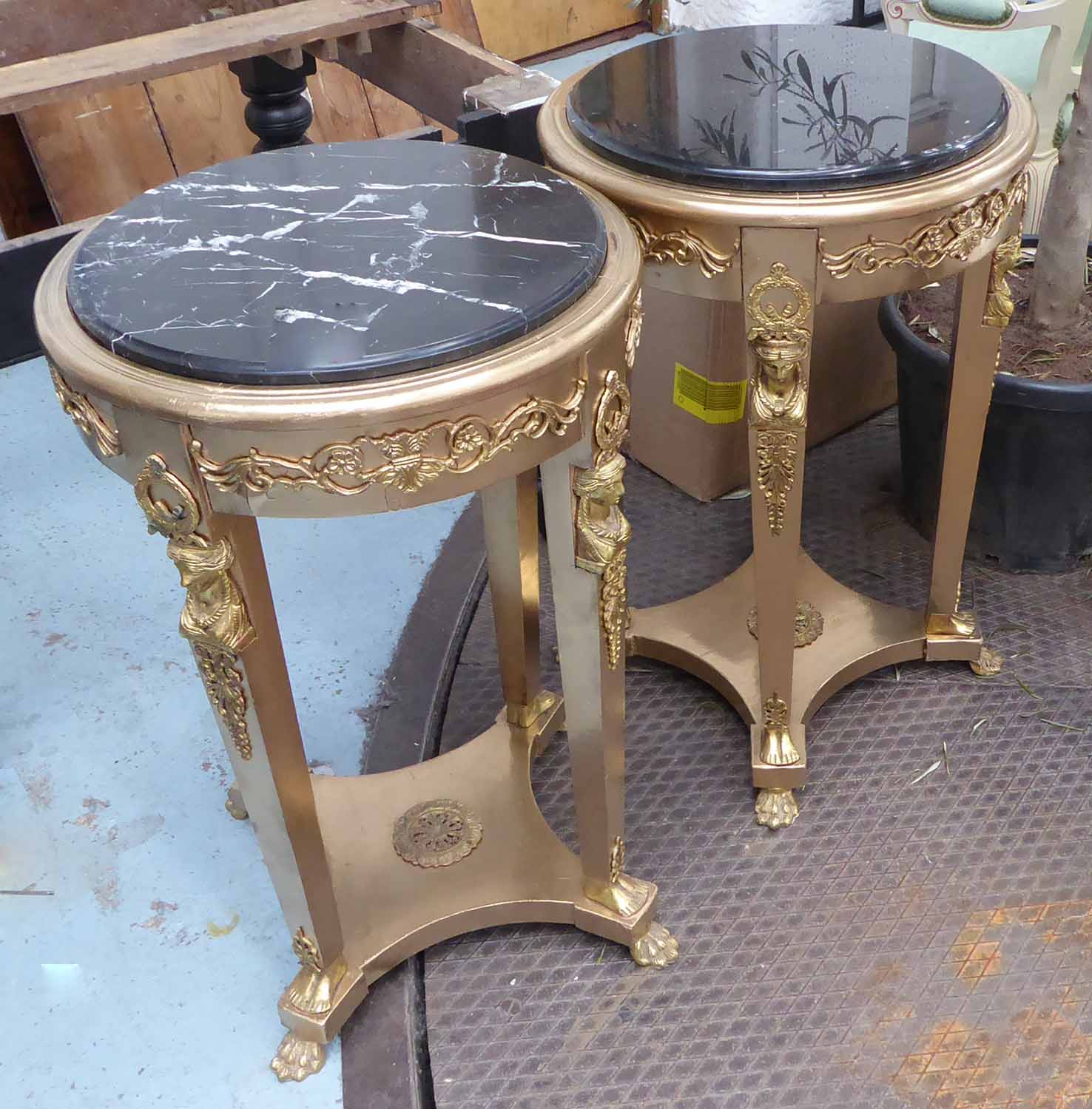 SIDE TABLES, a pair, in the French empire style, 85cm x 54cm Diam.