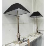 TABLE LAMPS, a pair, contemporary polished metal with black shades, 83cm H.