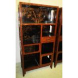 CHINESE SHELVES, red and black lacquered decorated with birds and foliage enclosing a short drawer,