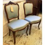 SIDE CHAIRS, a pair, French with carved showframes and blue upholstery, each 49cm W x 92cm H.