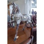 GERMANIC STYLE HORSE, carved limed wood, with polychrome detail, 86cm H.