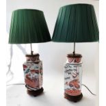 TABLE LAMPS, a pair, Chinese ceramic, of facetted vase form and Imari colouring, with shades,