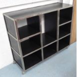 INDUSTRIAL DESIGN SHELVING, on castors, ebonised shelving, 120cm x 41cm x 98cm.