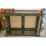 CONSOLE TABLE, Regency style ebonised, anthemion decorated and brass mounted with black glass top,
