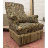 ARMCHAIR, late 19th century upholstered in paisley fabric,
