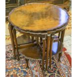 NEST OF TABLES, Georgian style mahogany comprising a circular table,