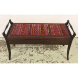 DUET STOOL, Edwardian mahogany with rising top, upholstered in vibrant geometrical fabric,