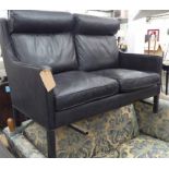 SOFA, two seater, black leather on square supports, 132cm L x 93cm H.