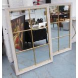 ORANGERY WALL MIRRORS, a pair, French provincial inspired, white painted with gilt detail,