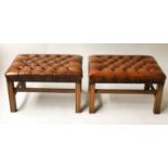 FOOTSTOOLS, a pair, George III design, faded mahogany and rectangular buttoned brown leather.