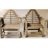 'LUTYENS' GARDEN ARMCHAIRS, a pair, silvery weathered teak, of slatted construction,