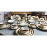 DINNER SERVICE, English fine bone china, Minton Buckingham Gold, twelve place, seven piece settings.