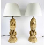 THOMAS BLAKEMORE TABLE LAMPS, a pair, seated lions with Pooky silk shades, 62cm H.