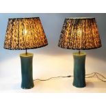 TABLE LAMPS, a pair studio ceramic, in blue slipwear with waisted form, with shades, 83cm H.