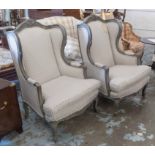 WING BACK CHAIRS, a pair, French style with grey painted showframes and ticking upholstery,