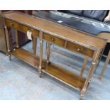 HALL TABLE, Regency design, gilt with leathered detail, 148cm x 28cm x 86cm.