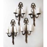 WALL LIGHTS, a set of four, Louis XVI style, gilt metal, each two branch,