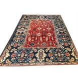 SULTANABAD CARPET, 304cm x 243cm, stylised palmette and vine design within a matching border.