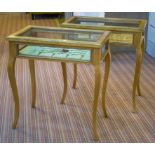 BIJOUTERIE TABLES, a pair, Louis XV style birds eye maple and brass mounted with hinged glazed tops,