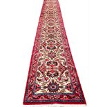 NORTH WEST PERSIAN LONG RUNNER, 591cm x 76cm,