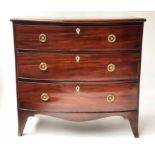 BOWFRONT CHEST, Regency figured mahogany of small proportions with three long graduated drawers,