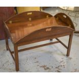 BUTLER'S TRAY ON STAND, mahogany in Georgian style with brass hinges and drop flaps,