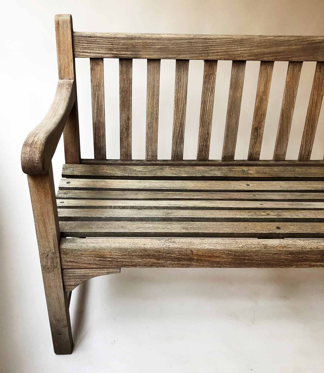 GARDEN BENCH, silvery weathered teak of slatted construction, 122cm W. - Image 2 of 3