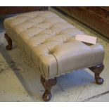 FOOTSTOOL, buttoned olive coloured leather on carved cabriole supports, 80cm x 41cm x 33cm H.