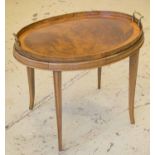 TRAY TABLE, George III mahogany and oval satinwood banded with brass handles on later stand,