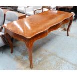 LIBRARY TABLE, Louis XV style, tulipwood with shaped marquetry top and brass mounts,