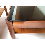 LOW TABLES, a pair, 1970's Myers teak rounded rectangular with sepia glass and undertier,