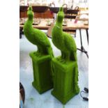 FAUX GRASS PEACOCKS, a pair, 100cm H.