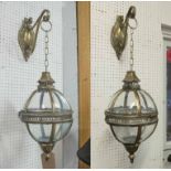 WALL LANTERNS, a pair, Regency style, gilt metal with spherical glass shades, 82cm H x 25cm.