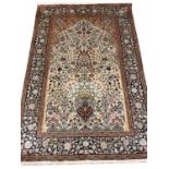 FINE PURE SILK TEHRAN DESIGN RUG, 184cm x 124cm.