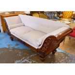 SOFA, early 19th century with a mahogany carved showframe and ticking upholstery,